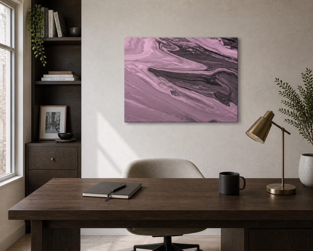 Modern home office with a wooden desk, chair, lamp, and abstract purple and black painting on the wall.